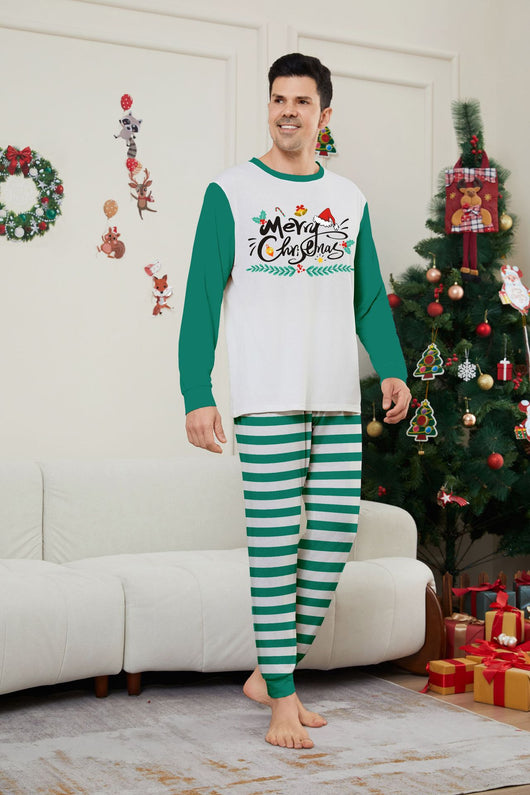 Family of four wearing matching green and white striped Christmas pajamas with "Merry Christmas" graphic. - Image 8