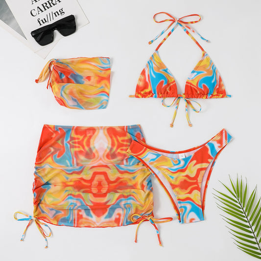 Four-piece tie-dyed bikini swimsuit set in orange, yellow, and white, with a triangle top, high-cut bottoms, ruched mini skirt, and matching headscarf. - Image 2