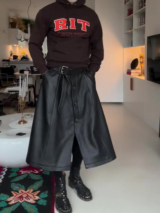 Falda Midi de Cuero Negro con Corte Ancho