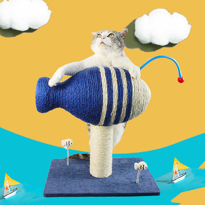 Blue and white striped fish-shaped sisal cat scratching post with a purple base, next to a black and white cat. - Image 3