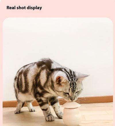 Two pink intelligent electric cat toy tumblers with ribbed tops and red laser emitters, set against a minimalist pink background. - Image 13