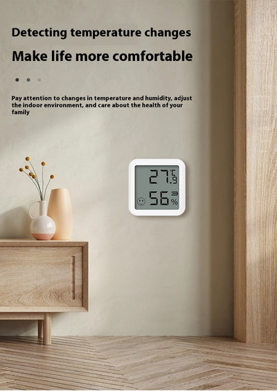 White mini Bluetooth temperature and humidity sensor with LCD display showing 27.9°C and 56% humidity. - Image 7
