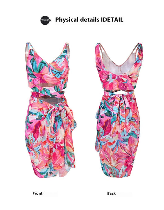 Women's three-piece swimwear set with a cream floral print, ruffled crop top, high-waisted shorts, and matching sarong. - Image 11