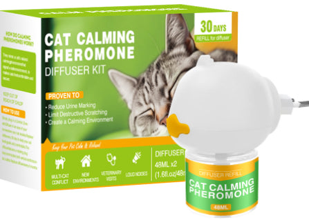 Cat Calming Pheromone Diffuser Kit with a white plug-in diffuser and a green refill bottle, next to its green and white box. - Image 6