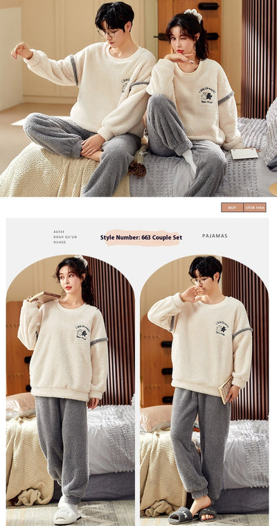 Couple wearing matching cream coral fleece pajamas with gray pants and bear embroidery, seated on a bed. - Image 14