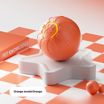 Orange smart jumping ball pet toy with bone and paw print details, featuring a glowing paw print. - Image 10