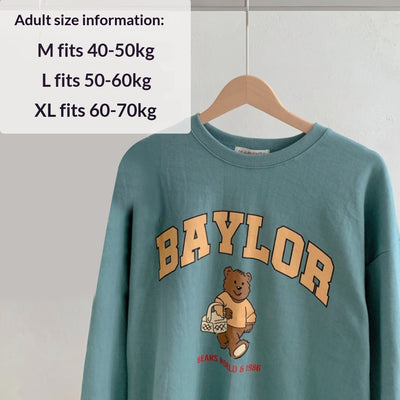 Large dog wearing a teal fleece-lined sweatshirt with 'BAYLOR' text and a bear graphic on the back. - Image 11