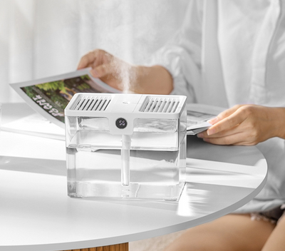 White rectangular humidifier with a gray handle and a digital display showing '86' on a white background. - Image 17