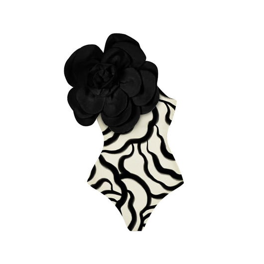 Black one-piece swimsuit with a large 3D flower on one shoulder and a geometric pattern on the bodice. - Image 11