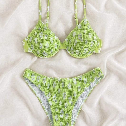 Periwinkle blue two-piece swimsuit with white floral pattern and ruched texture, featuring an underwire bikini top and high-cut bottoms. - Image 4