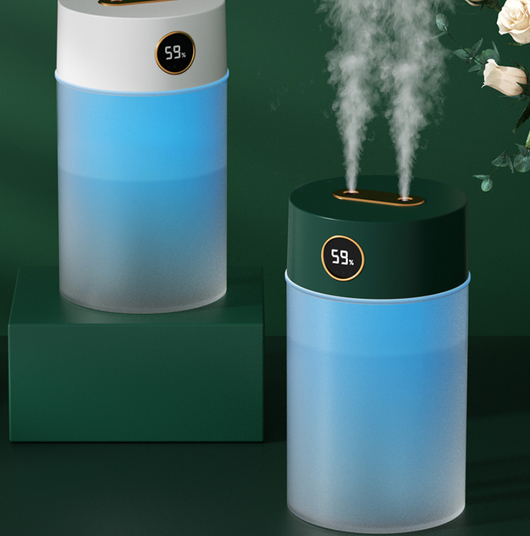 White cylindrical humidifier with a gold nozzle emitting mist, featuring a subtle bear emblem. Includes five aromatherapy oil bottles. - Image 12