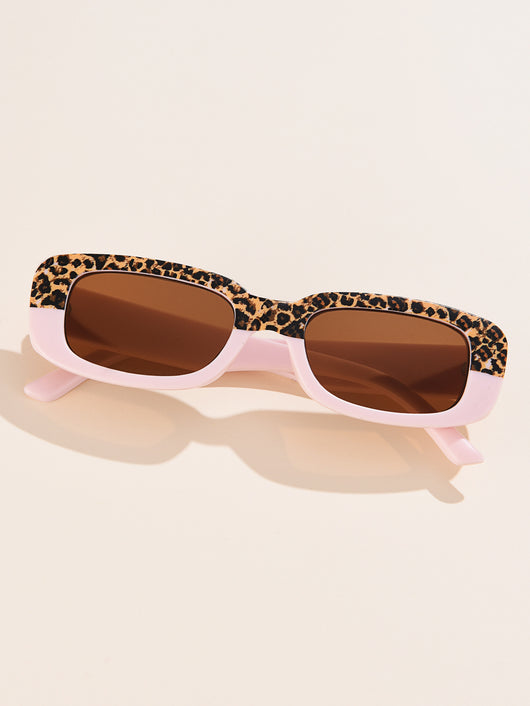 Rectangular tortoiseshell sunglasses with a small frame and dark gray lenses, angled on a white background. - Image 34