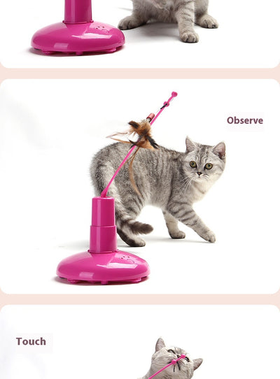 Pink automatic cat toy with a rotating pole and a brown feather attachment, measuring 15cm high. - Image 14