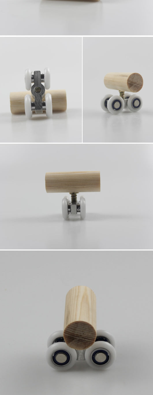 Wooden bird toy resembling a roller skate with a pine log body and four white wheels with metal bearings. - Image 11