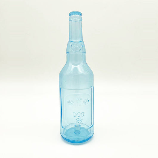 Translucent blue pet molar toy shaped like a bottle, featuring embossed paw prints and the word "DOG". - Image 7