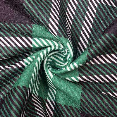 Family matching Christmas pajamas with "Dear Santa They're the Naughty Ones" print and green plaid pants. - Image 22