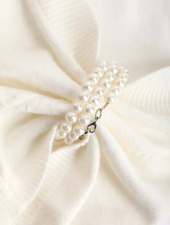 Blusa de Punto Blanco con Cadena de Perlas y Manga Corta