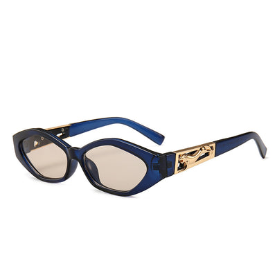 Angular cat-eye sunglasses with a tortoiseshell frame, brown gradient lenses, and gold jumping cheetah temple details. - Image 23