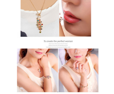 Gold tone peacock bridal jewelry set with colorful crystal accents, including a necklace, bracelet, and dangle earrings. - Image 9