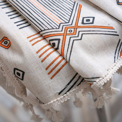 Boho cream cotton and linen curtain with tribal print in black and orange, featuring black fringe tassels. - Image 24