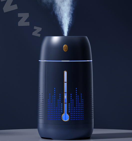 White cylindrical household humidifier with a visible water level indicator, next to its brown cardboard packaging. - Image 19