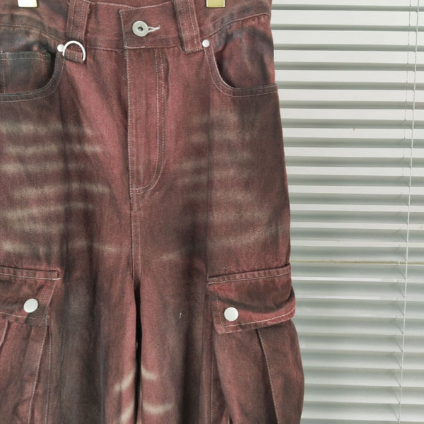 Pantalón Denim Rojo Óxido Ancho con Bolsillos Grandes y Efecto Desgastado