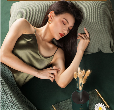 Dark green cylindrical humidifier with a black top, 300mL capacity, and a single control button. - Image 11