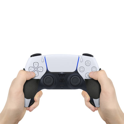 Pair of gamepad silicone stickers, one black with textured grip and one solid red, for enhanced controller grip. - Image 11