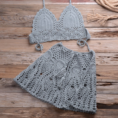 Light beige crochet bikini set with a halter crop top and a matching open-knit mini skirt with tassels. - Image 26