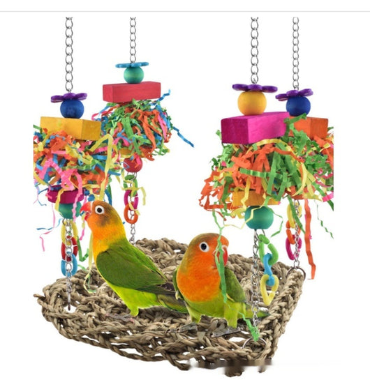 Colorful parrot toy with a woven grass hammock, hanging ropes, wooden blocks, and woven balls, with two parrots. - Image 7