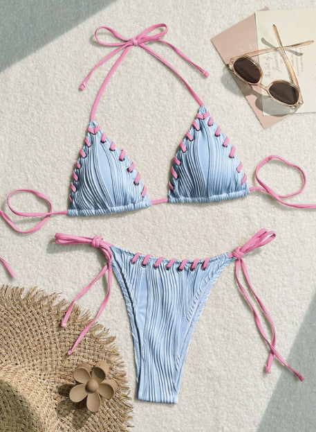 Light blue ribbed bikini swimsuit with pink tie straps and lacing detail, featuring a triangle top and thong bottom. - Image 12