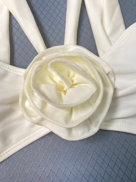 Cream ruched swim skirt for women, featuring a 3D flower embellishment at the bottom hem. - Image 18