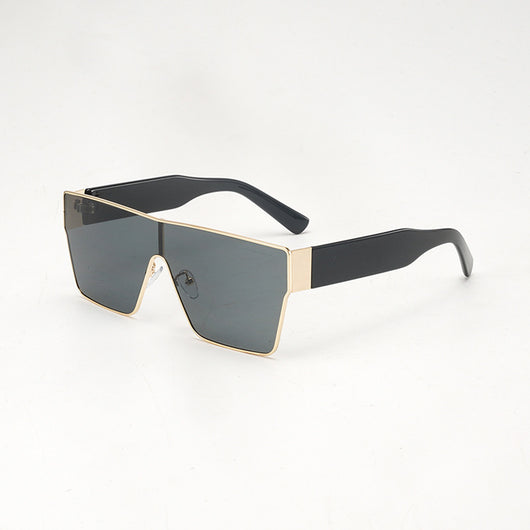 Oversized square sunglasses with a gold metal frame, dark gray lenses, and black plastic temples. - Image 6