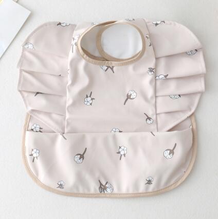 Babero Impermeable con Bolsillo Alas de Ángel para Bebé - Image 23
