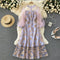 Vestido Elegante con Mangas Linterna de Malla y Bordado Calado