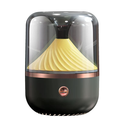 Dark green aromatherapy machine with a transparent top, yellow spiral diffuser, and copper trim. - Image 3