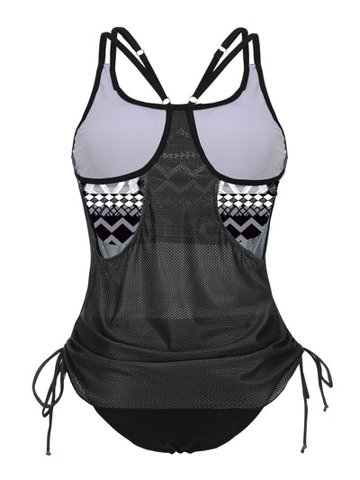 Olive green tankini top with white palm trees and 'live simple' text, paired with black swim bottoms on a beach. - Image 13