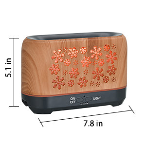 Wood grain humidifier with snowflake pattern, emitting blue flame-like mist, shown with remote control and other color options. - Image 13