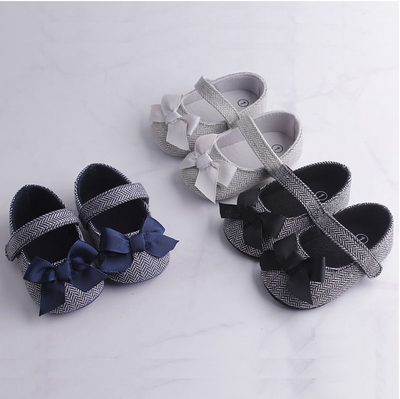 Grey herringbone baby crib shoes with white grosgrain bows and a single strap, perfect for toddlers. - Image 8