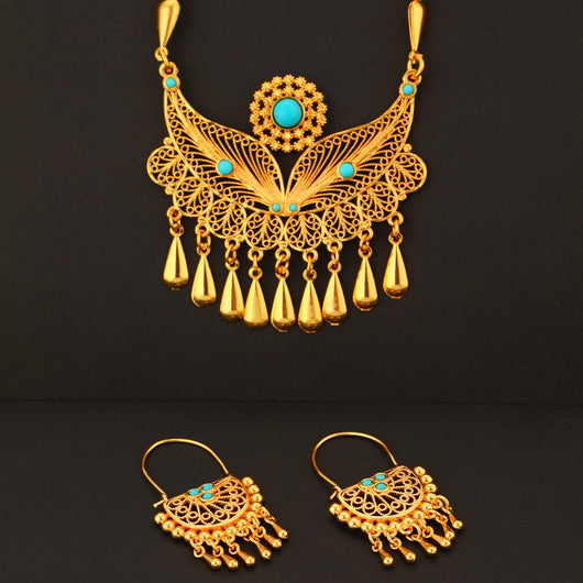 Gold-toned necklace and dangle earrings set with filigree water droplet design, turquoise accents, and tassel charms. - Image 10