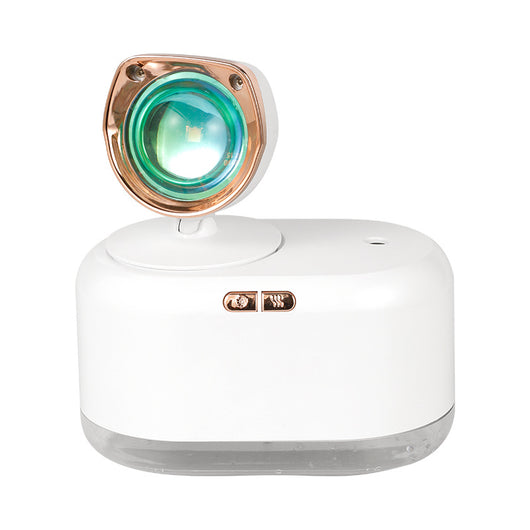White 2-in-1 mini wireless sunset lamp and air humidifier with a rose gold accent and clear water tank. - Image 14