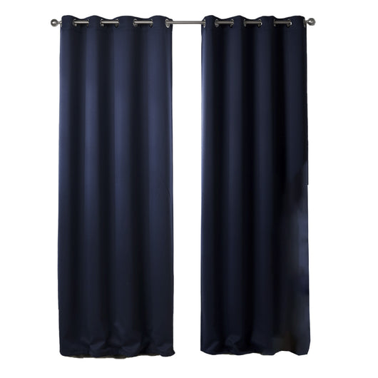 Dark blue blackout curtains with silver grommet tops hanging on a rod in a modern bedroom setting. - Image 2