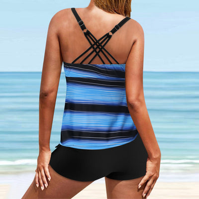Fuchsia pink tankini swimsuit for women featuring a pleated halter top and matching swim shorts, modeled on a beach. - Image 21