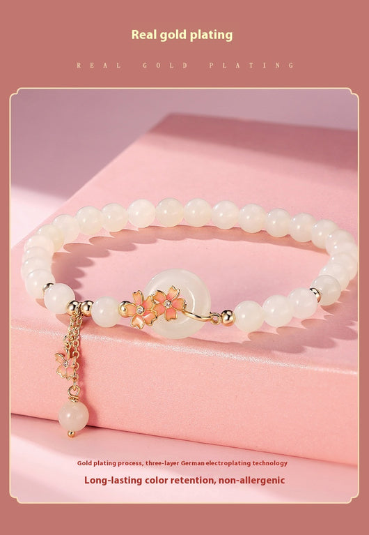 Joya de Jade Hetian con Plata 925 - Diseño Flor de Cerezo Estilo Mori Elegante - Image 12