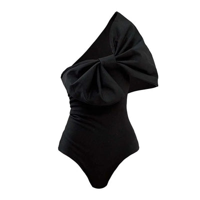 Black one-piece swimsuit with a white oversized bow detail at the tube top bust, perfect for summer. - Image 9