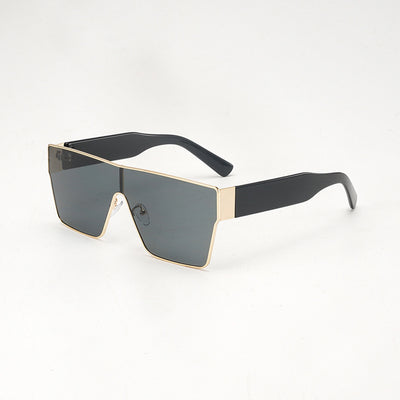 Oversized square sunglasses with a gold metal frame, dark gray lenses, and black plastic temples. - Image 17
