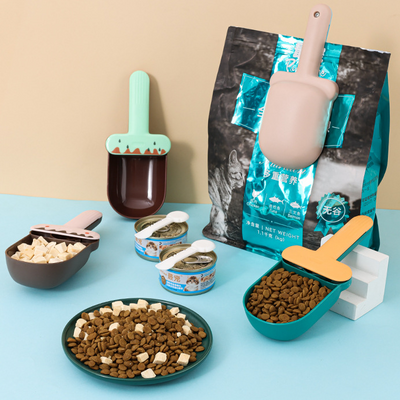 Comedero para Mascotas con Cuchara Integrada - Bolsa Práctica para Perros y Gatos