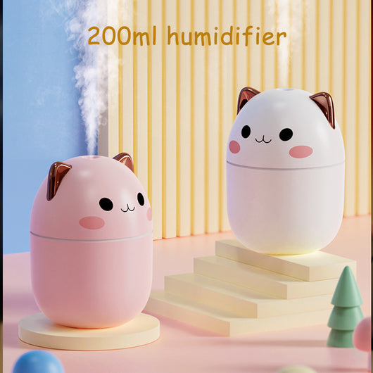 Three cute cat-shaped humidifiers in white, green, and pink, each with three filter sticks. - Image 16