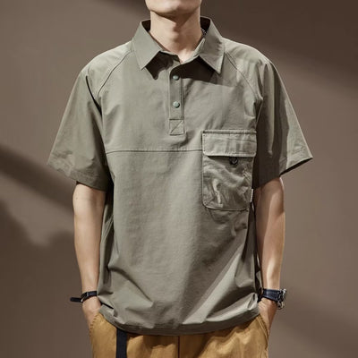 Men's khaki short-sleeve polo shirt with a lapel collar, three buttons, and a large flap chest pocket with a D-ring. - Image 4