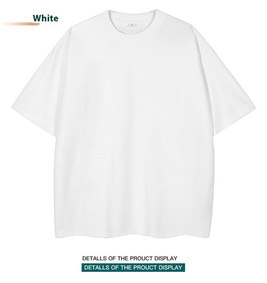Moss green short-sleeve cotton t-shirt with a crew neck and a relaxed, oversized fit. - Image 23